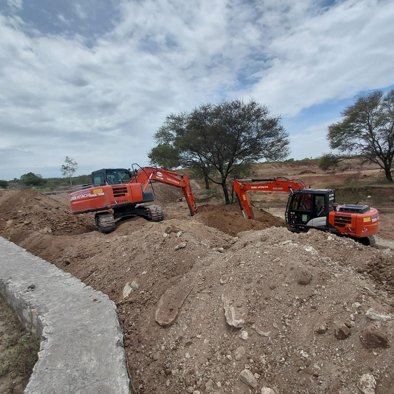 Excavators desilting the River Kousika course during restoration work, Coimbatore